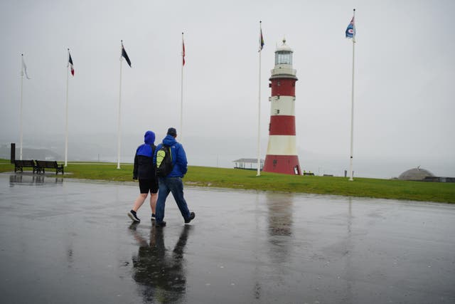 <p>Rain and wind is predicted for this weekend alongside sunny spells (Ben Birchall/PA)</p>