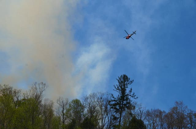 <p>Multiple wildfires have started in the days since a burn ban was lifted in North Carolina. The Bee Rock Creek fire has grown this week amid windy weather</p>