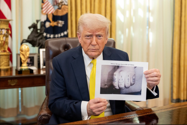 <p>Donald Trump posed with what appears to be a digitally altered image and claimed Kilmar Abrego Garcia has 'got MS-13 tattooed onto his knuckles’</p>